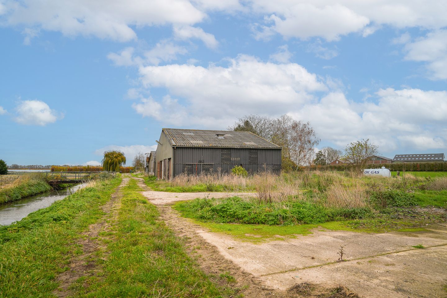 Detached farmhouse with spacious grounds and development potential in the Betuwe — 34