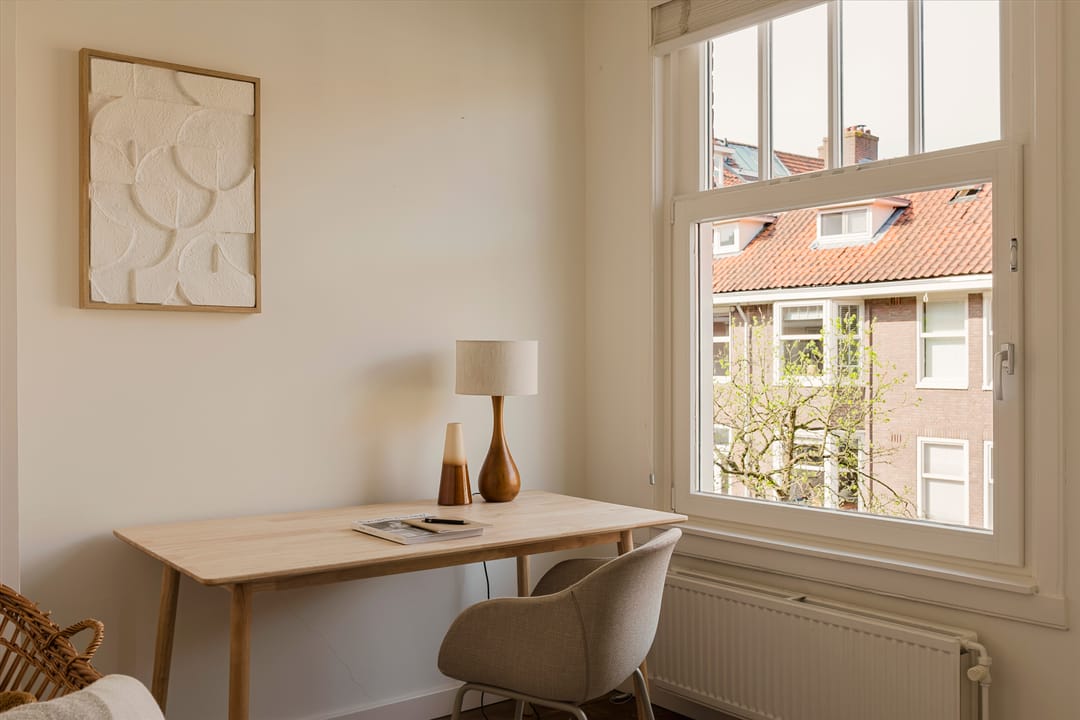 Photo 11 of Woestduinstraat 143-2