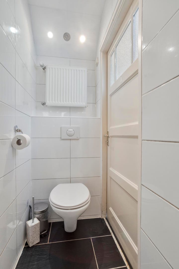 Tussenwoning te koop: van der Sluislaan 6, Heerenveen