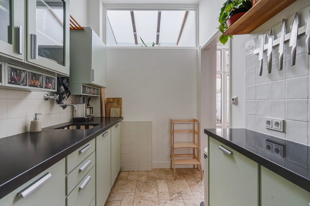 Charming 4-Room Ground Floor Apartment with Authentic Details and Southwest Garden — 23