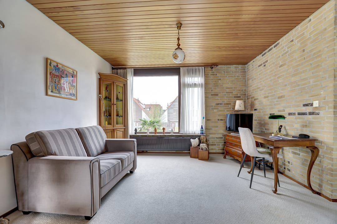Spacious split-level home with river views, character and versatile living options — 16