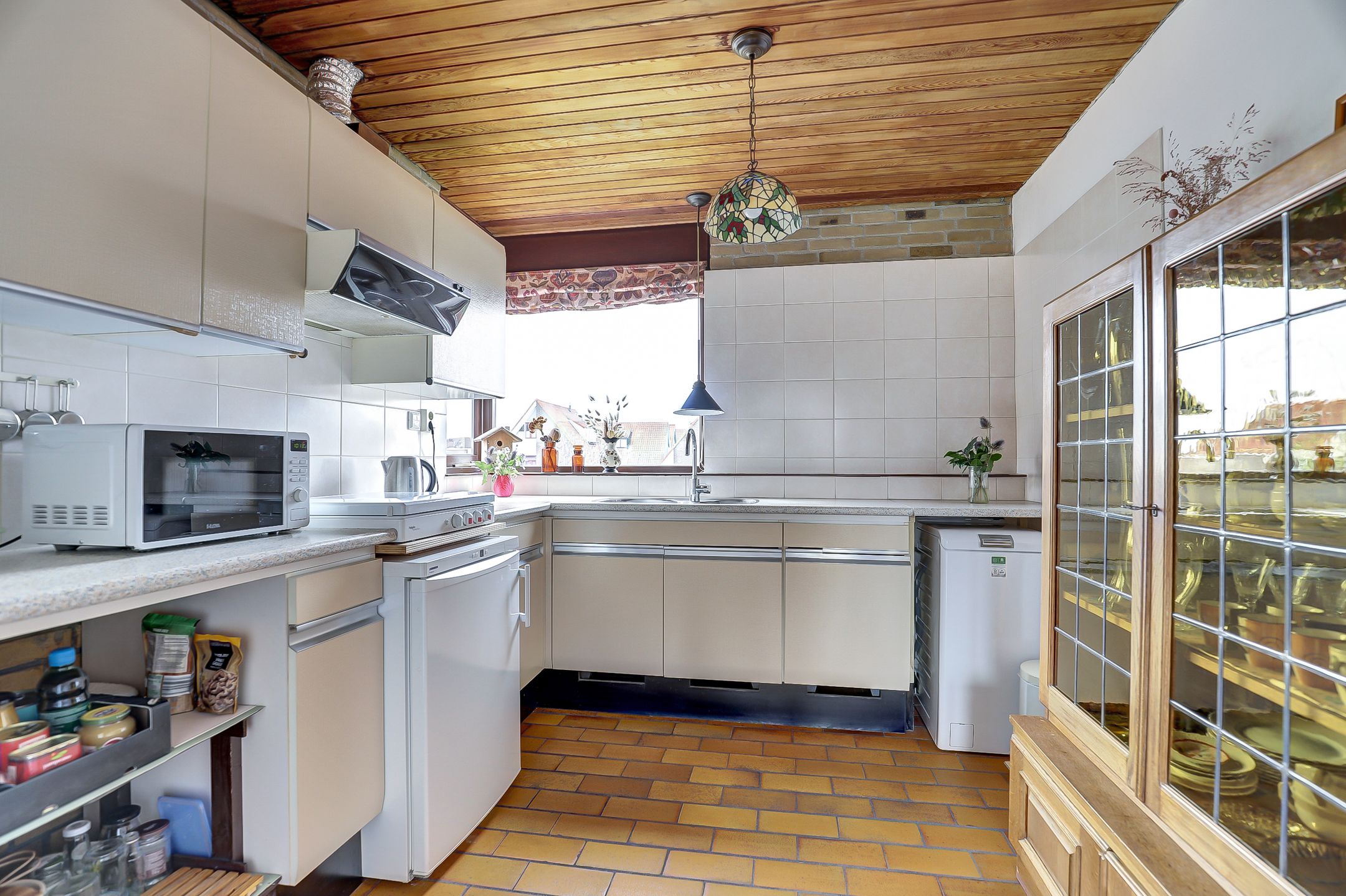 Spacious split-level home with river views, character and versatile living options — 18