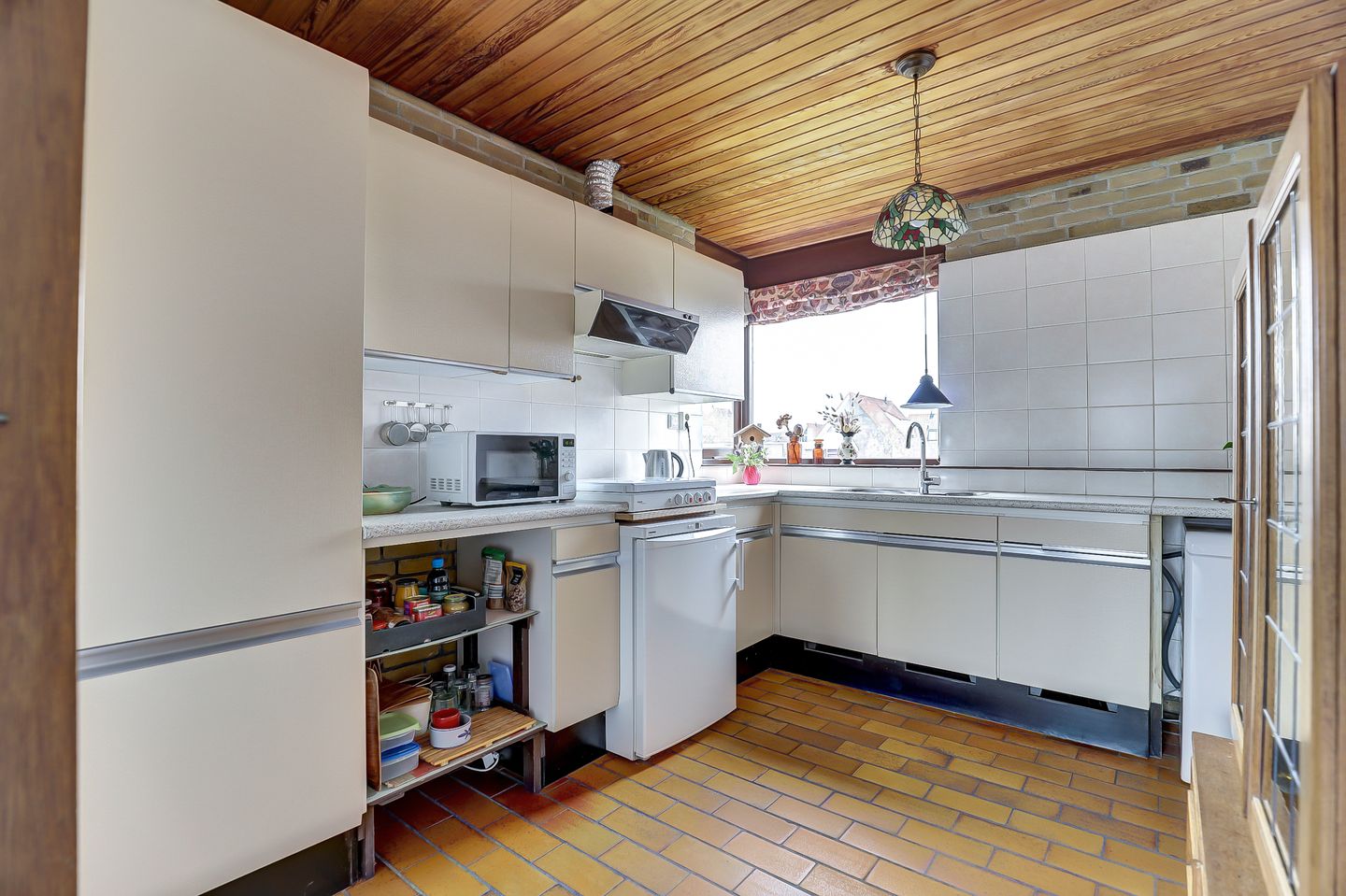 Spacious split-level home with river views, character and versatile living options — 19