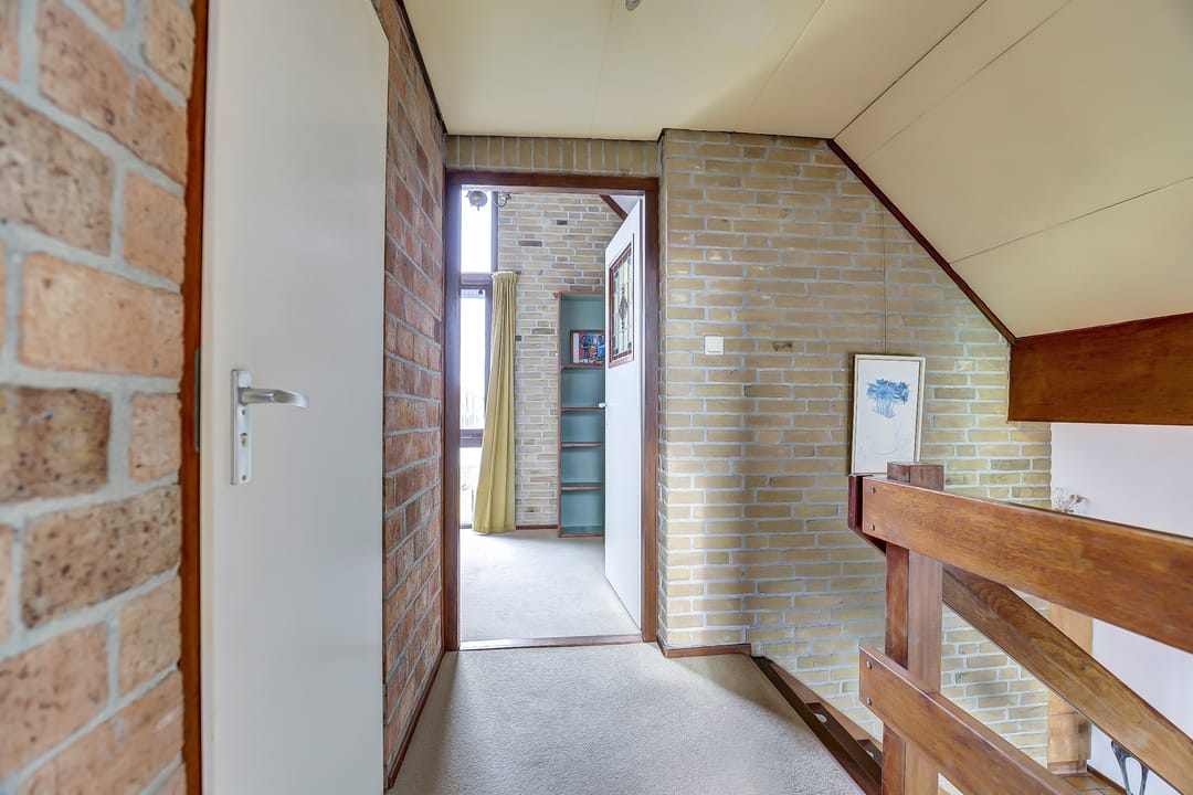 Spacious split-level home with river views, character and versatile living options — 28