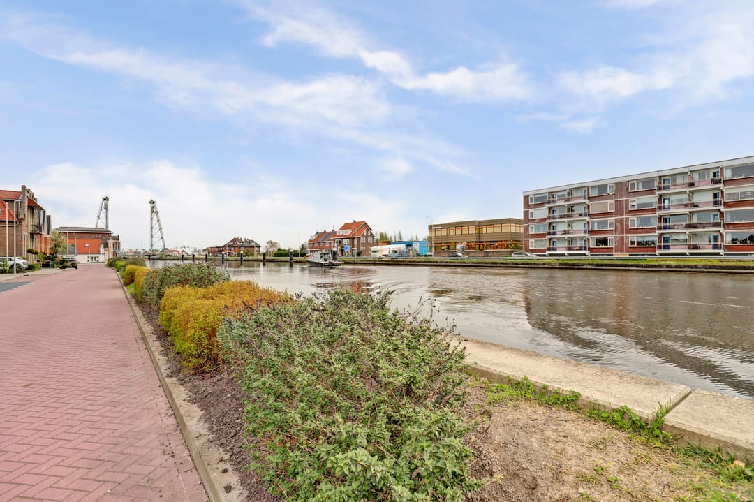 Spacious split-level home with river views, character and versatile living options — 46