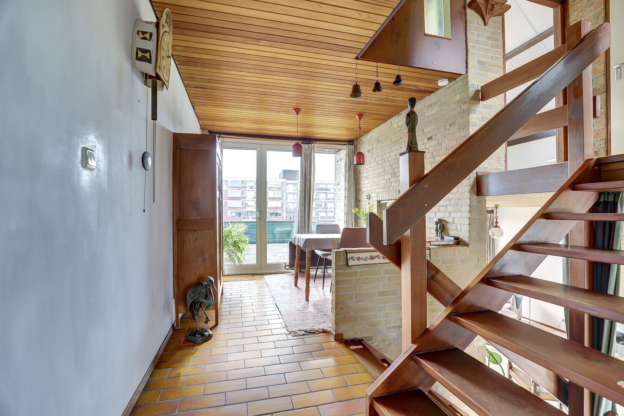 Spacious split-level home with river views, character and versatile living options — 21