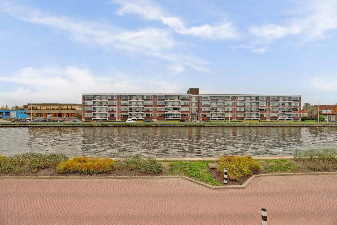Spacious split-level home with river views, character and versatile living options — 47