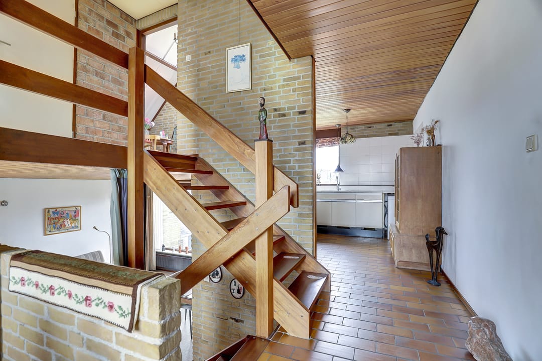 Spacious split-level home with river views, character and versatile living options — 17