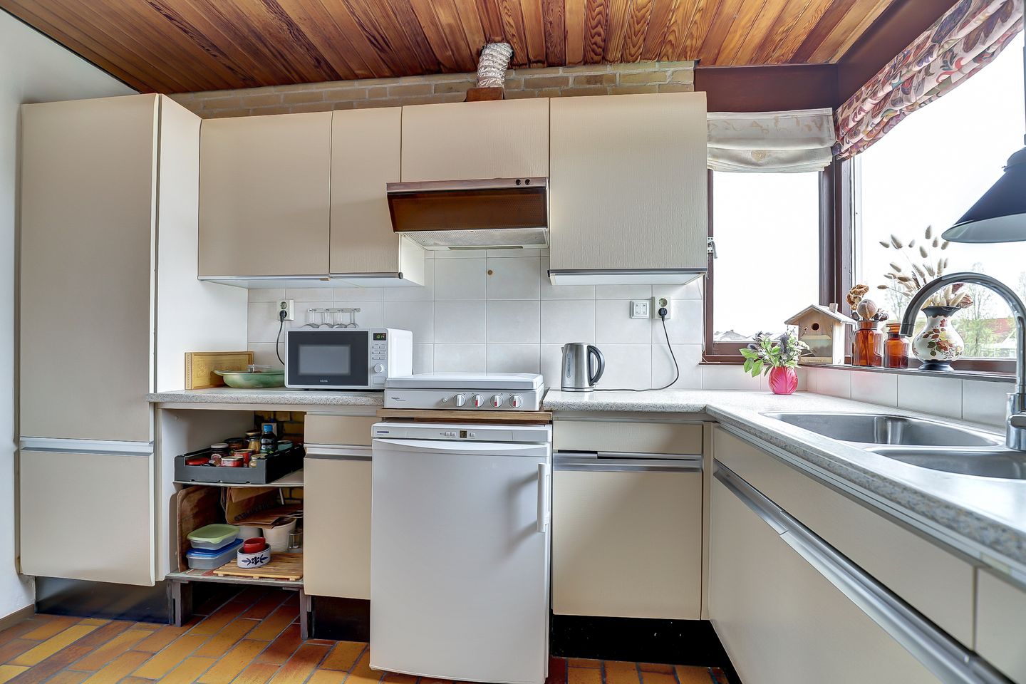 Spacious split-level home with river views, character and versatile living options — 20