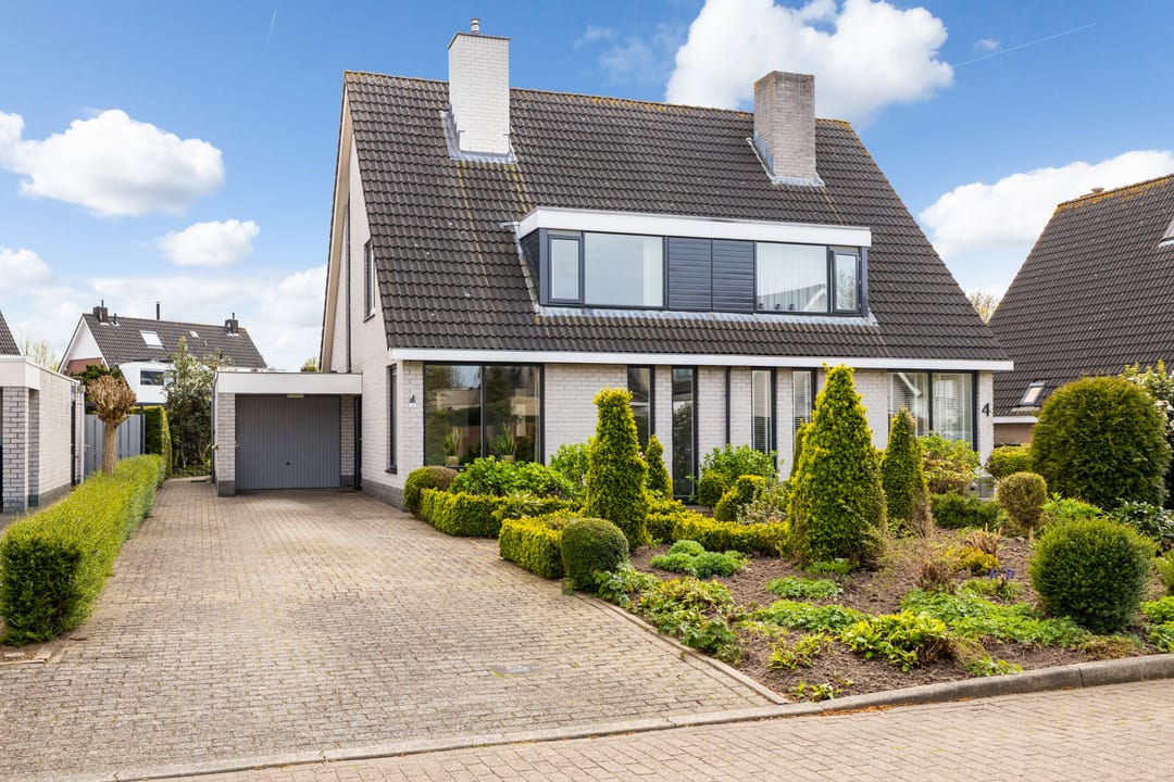 Ruime Halfvrijstaande Gezinswoning met Garage en Grote Tuin in Beesd