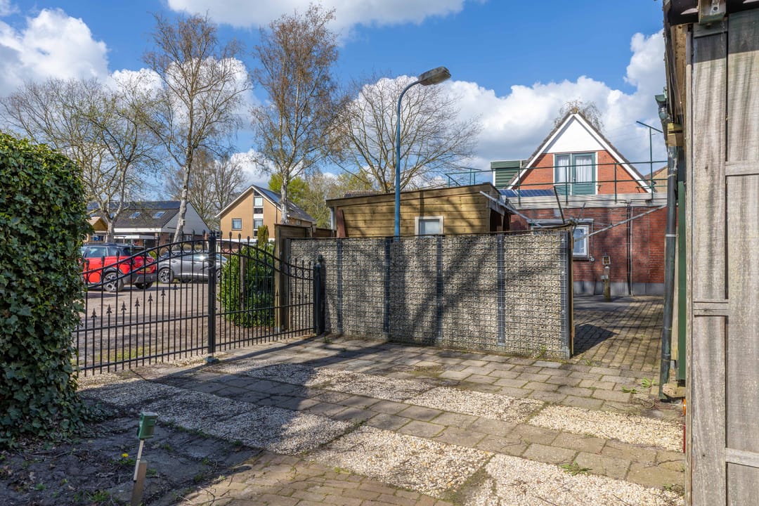Spacious detached home with sunny garden and double driveway in Drogeham — 37