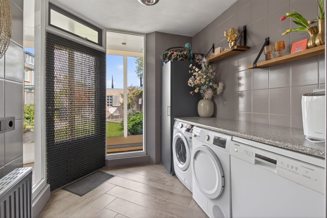 Spacious family home with A energy label, terrace canopy, and private garden in Valkenswaard — 17