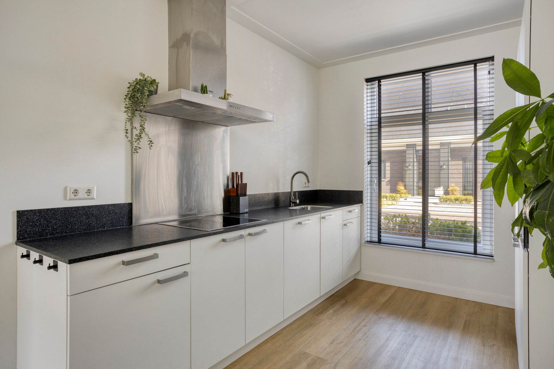 Modern terraced home in Zeeland with spacious attic and south-facing garden — 18