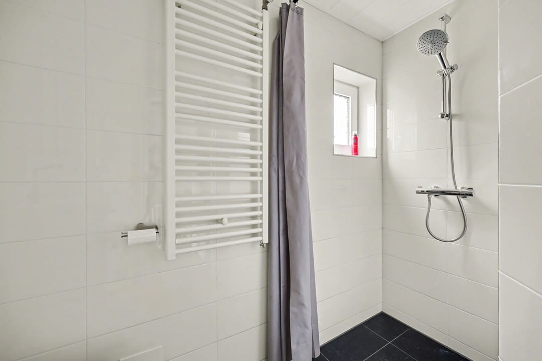 Well-maintained corner home with deep garden and attic conversion in Winterswijk — 28