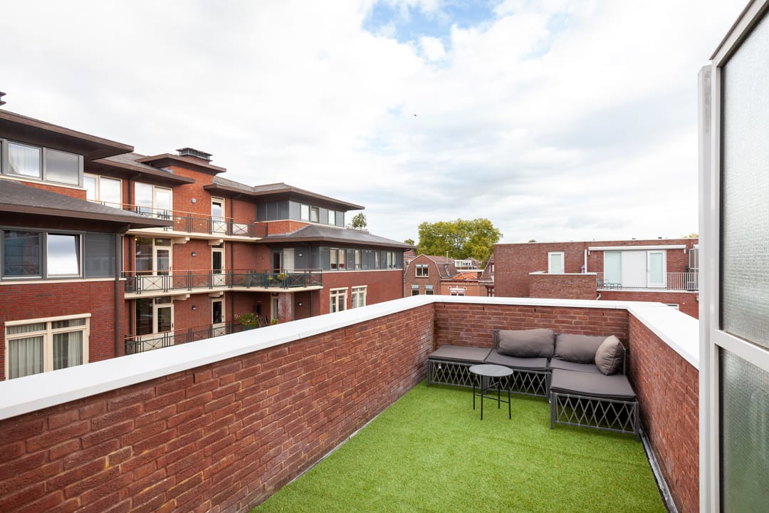 Spacious corner home with private garden and rooftop terrace in Woerden city center — 28