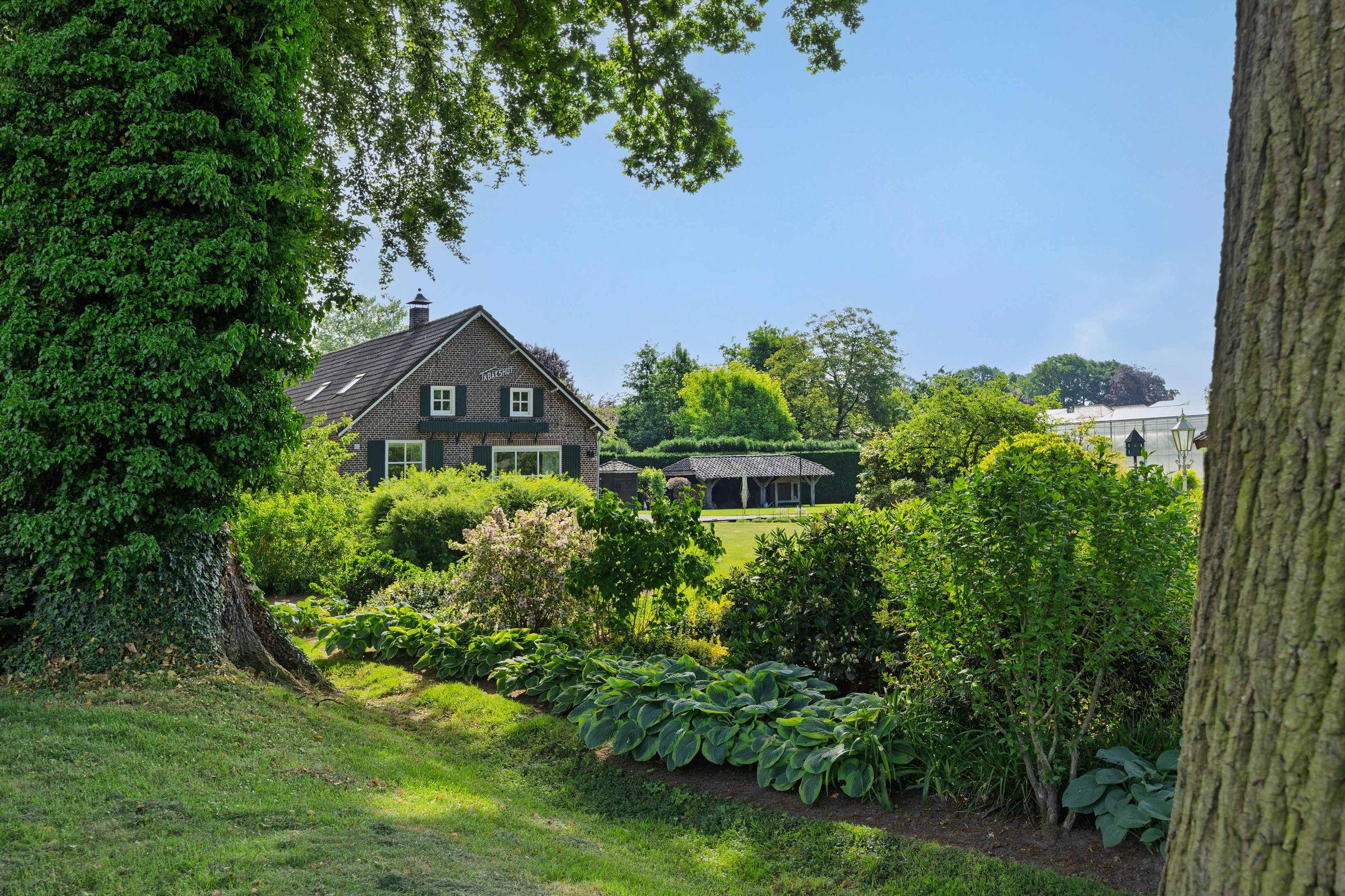 Spacious semi-detached farmhouse with large hobby space in peaceful Helenaveen — 42