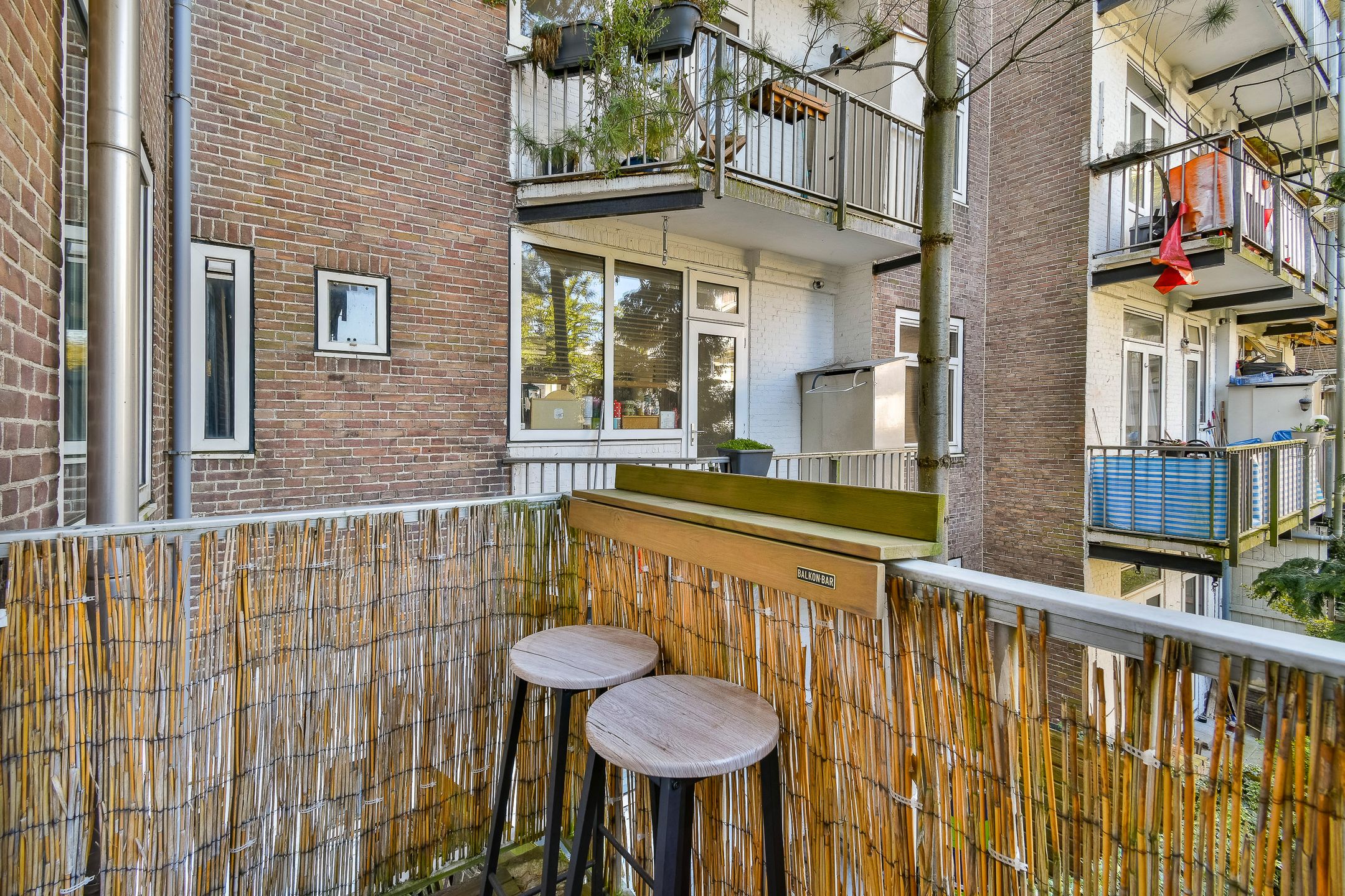 Renovated 3-Room Apartment with Water Views and Sunny West-Facing Balcony in De Baarsjes — 12