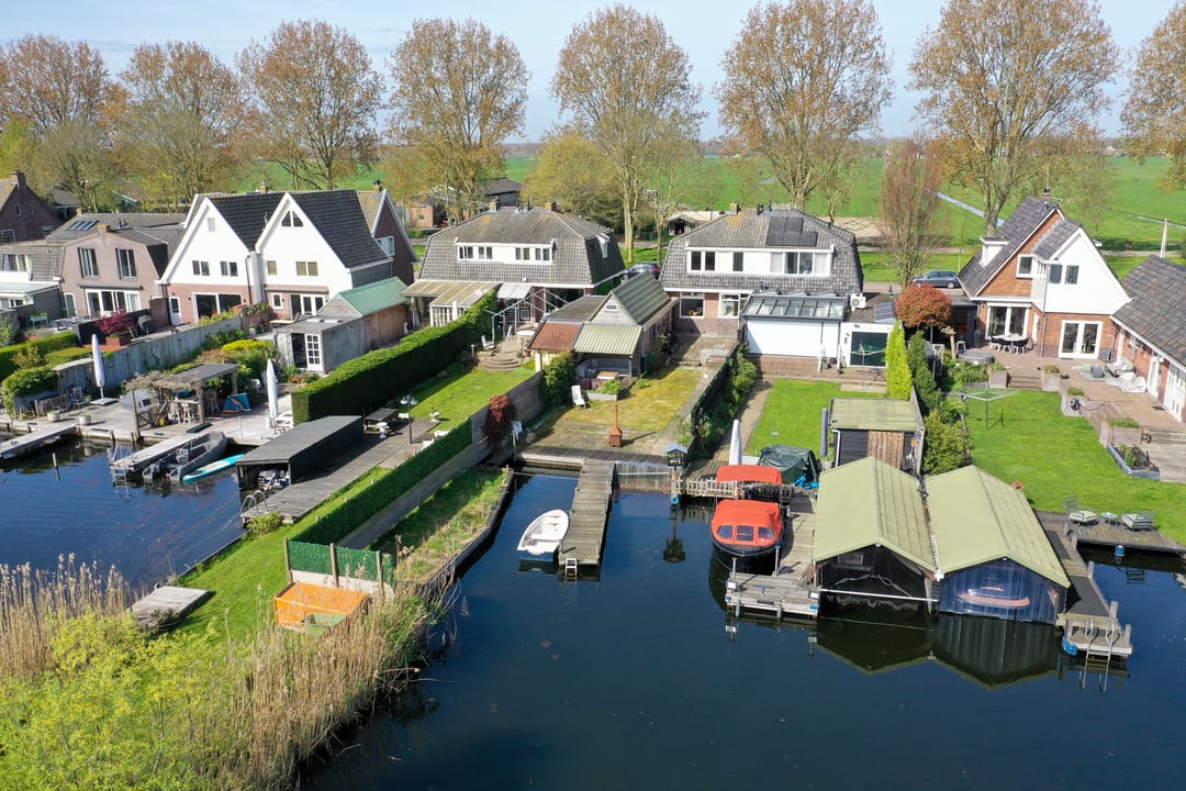 Characteristic 1930s Semi-Detached Home with Private Water Access and Boat Dock — 22