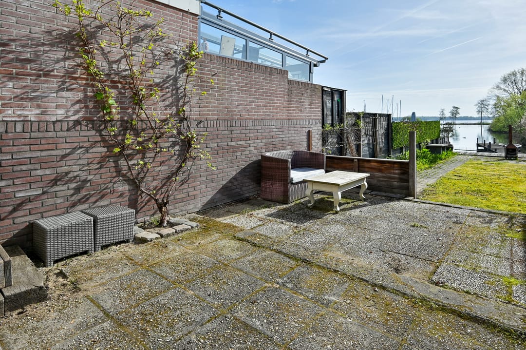 Characteristic 1930s Semi-Detached Home with Private Water Access and Boat Dock — 23