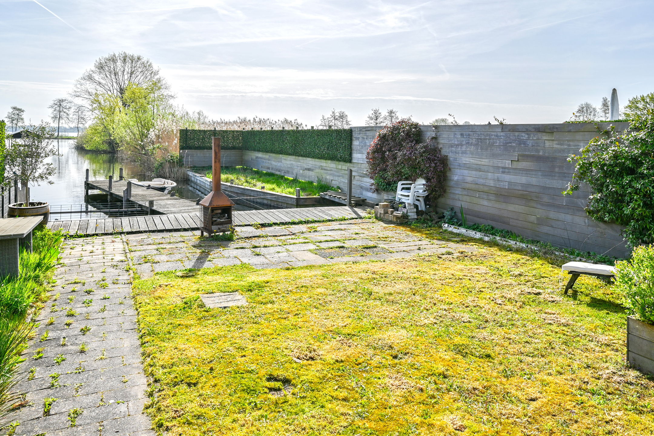 Characteristic 1930s Semi-Detached Home with Private Water Access and Boat Dock — 24