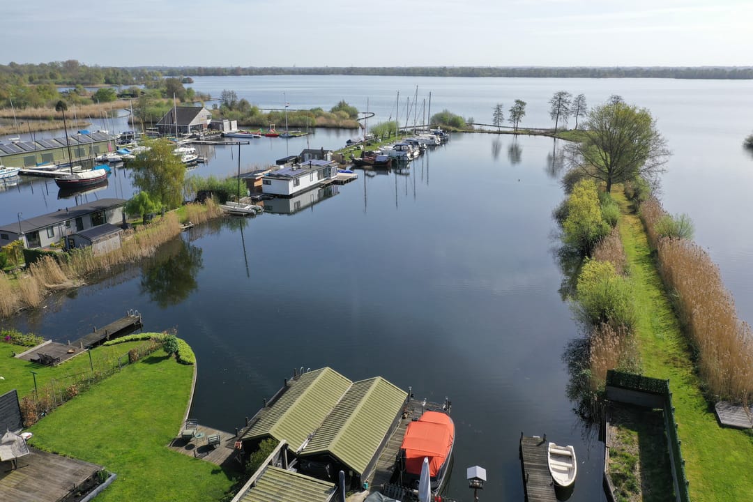 Characteristic 1930s Semi-Detached Home with Private Water Access and Boat Dock — 28