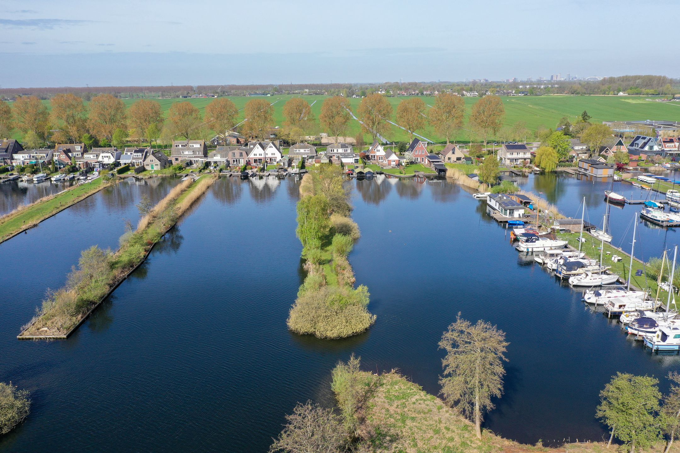 Characteristic 1930s Semi-Detached Home with Private Water Access and Boat Dock — 30