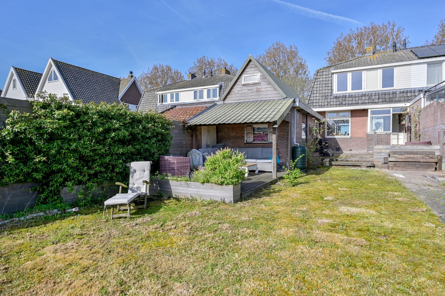 Characteristic 1930s Semi-Detached Home with Private Water Access and Boat Dock — 25