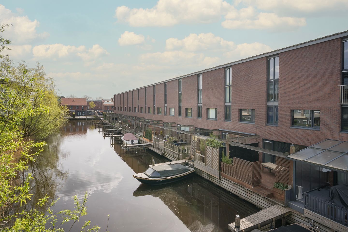 Modern terraced home with private dock on open waterway — 35
