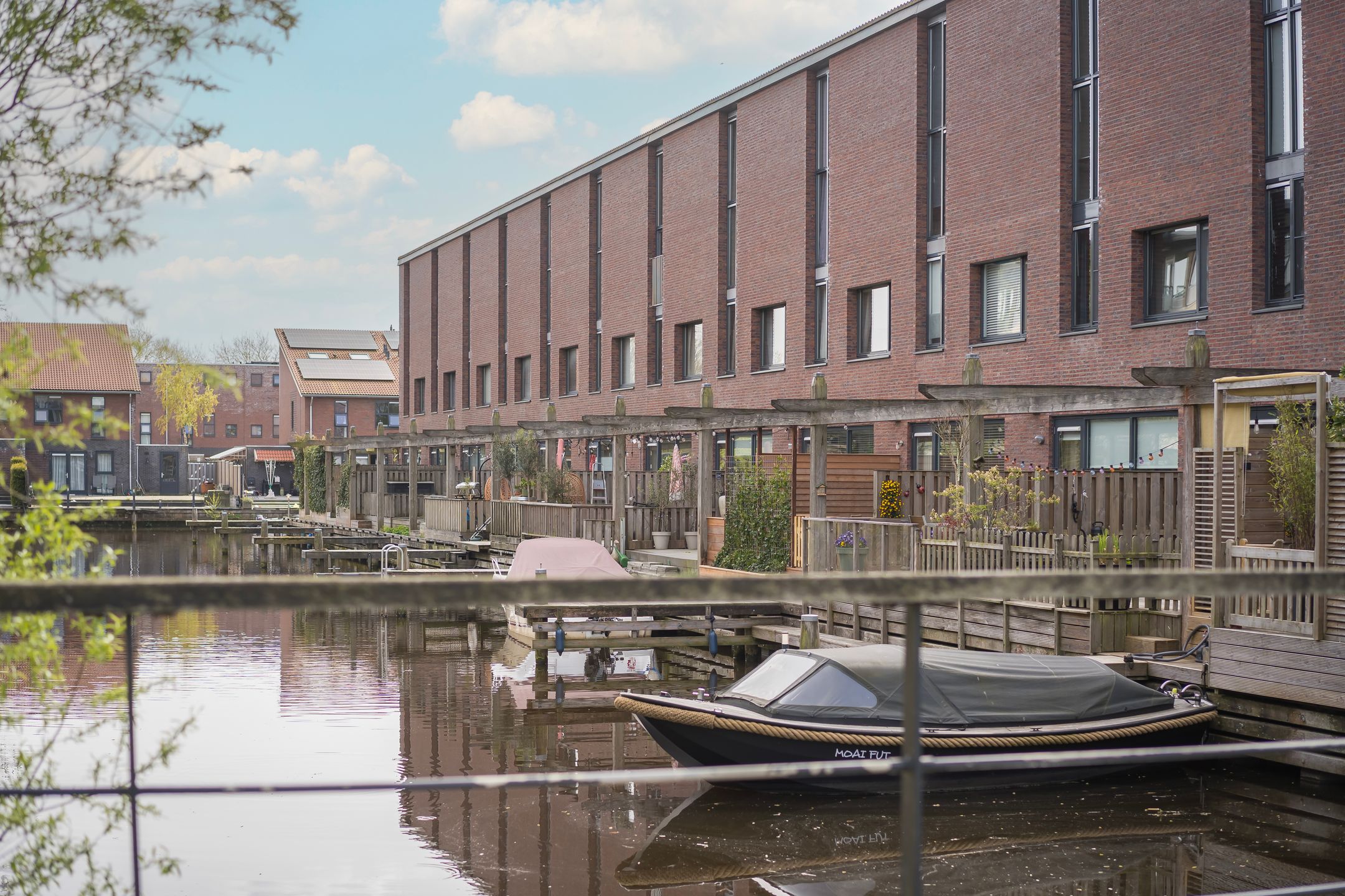 Modern terraced home with private dock on open waterway — 39
