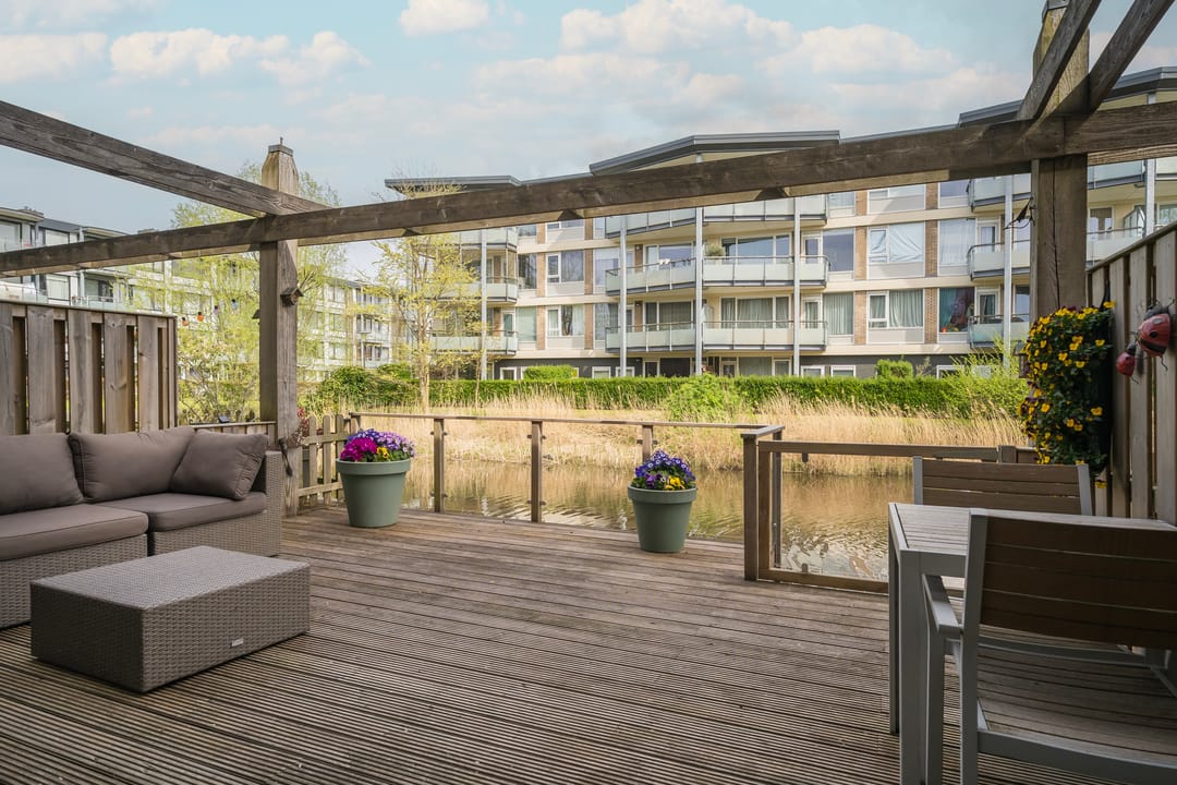 Modern terraced home with private dock on open waterway — 31