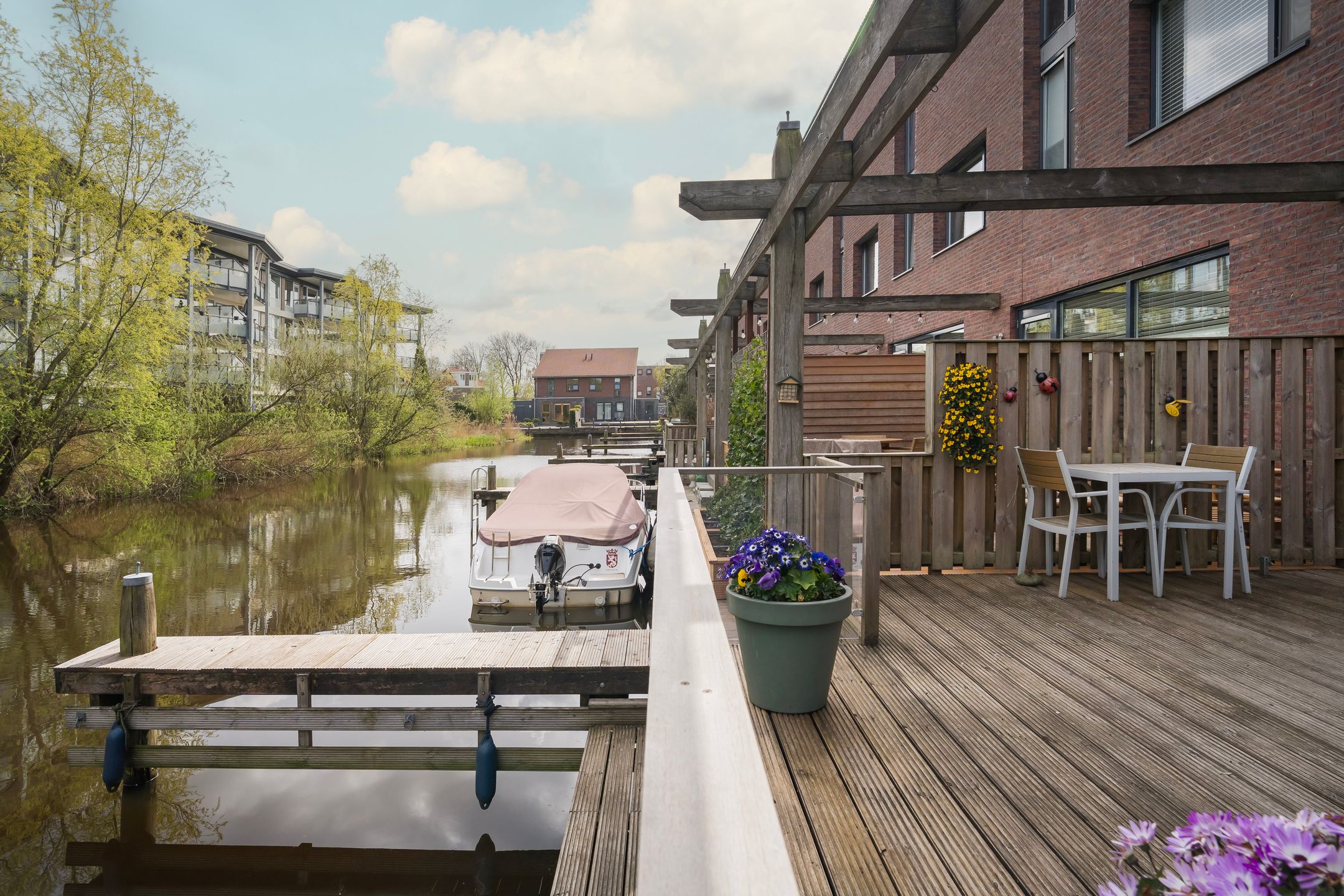 Modern terraced home with private dock on open waterway — 33