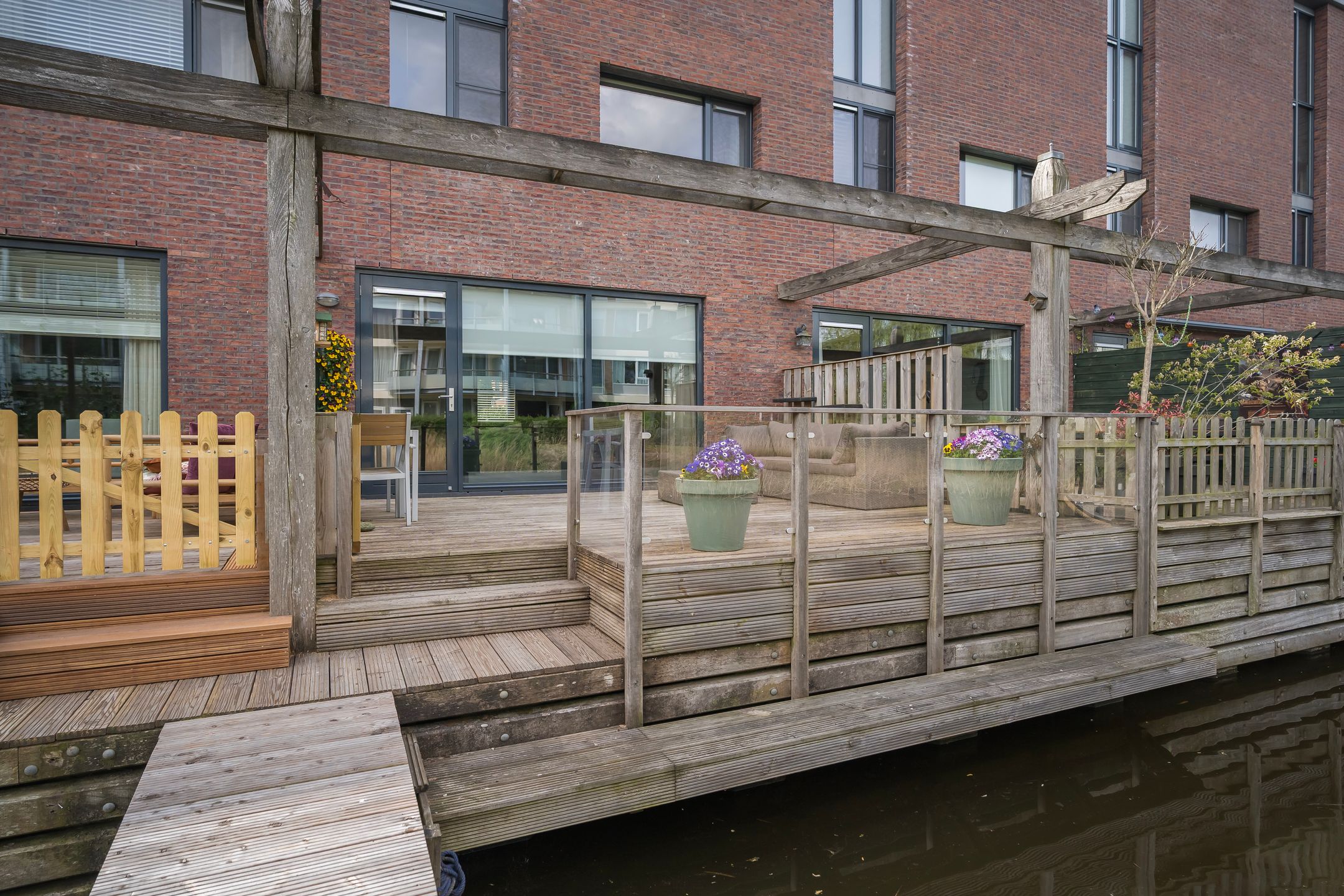 Modern terraced home with private dock on open waterway — 36