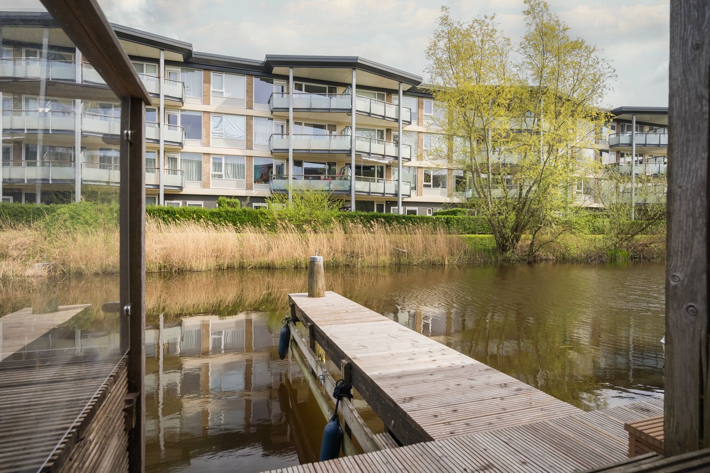 Modern terraced home with private dock on open waterway — 34