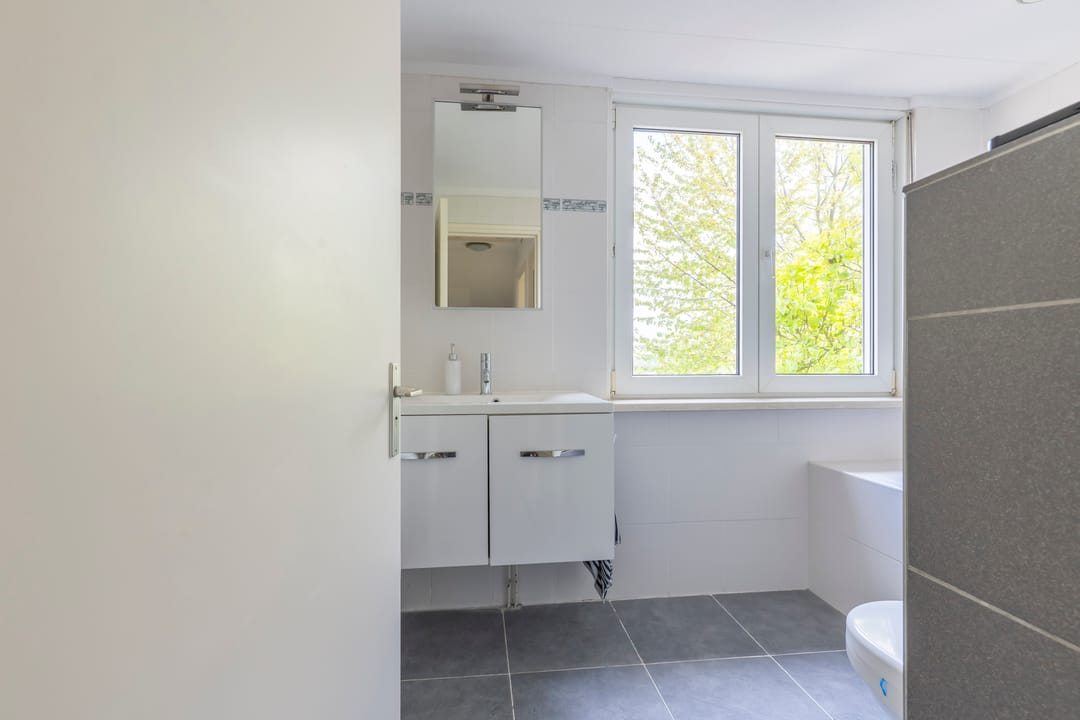 Spacious Corner Home with Garden and Large Garage in Quiet Hoensbroek Street — 16