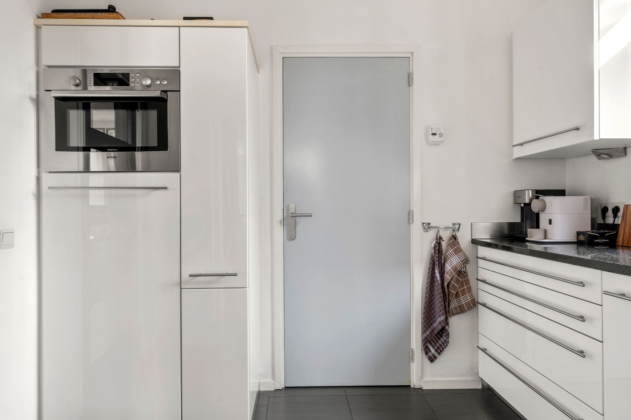 Well-maintained move-in ready detached home with large garage and sauna — 30