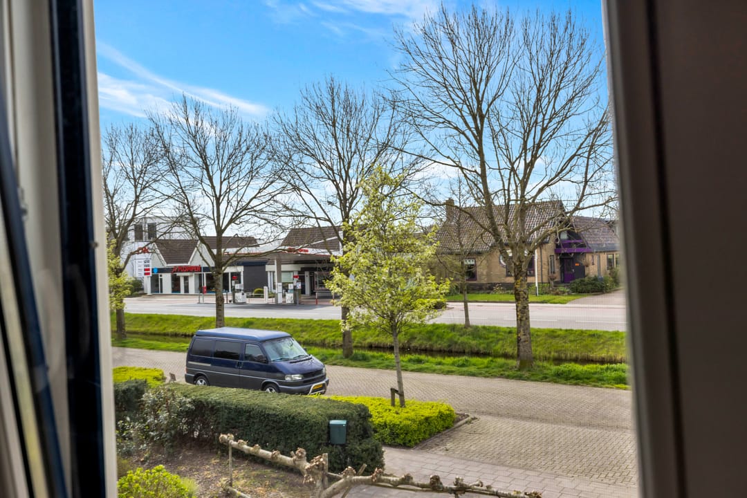 Vrijstaand wonen met aanbouw, royale schuur en verrassend diepe tuin — 23