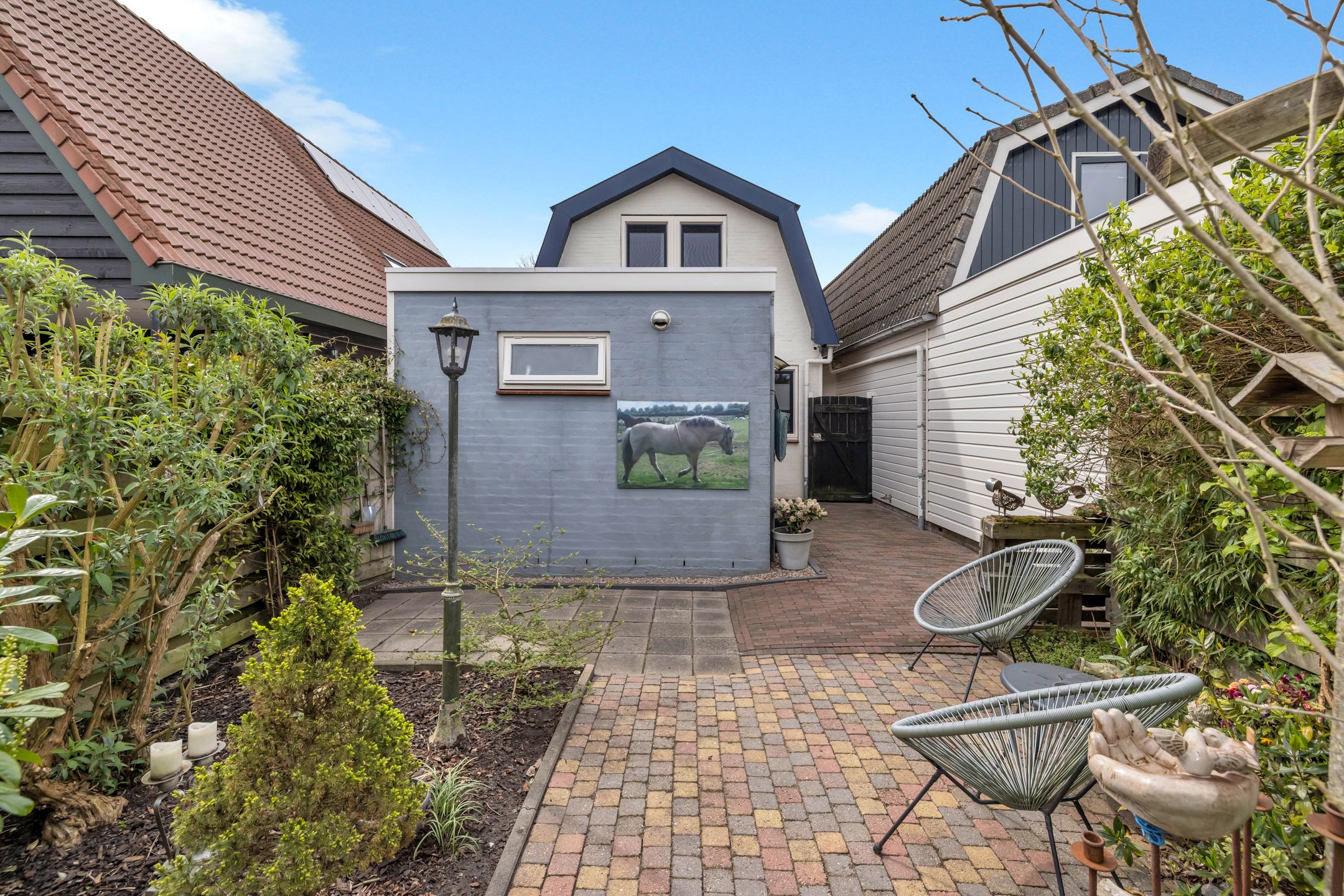 Vrijstaand wonen met aanbouw, royale schuur en verrassend diepe tuin — 30