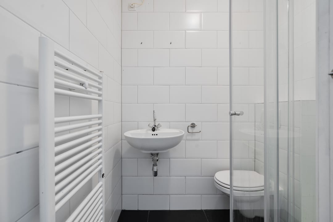 Light Renovated Apartment with South-Facing Balcony and 3-Room Potential — 26