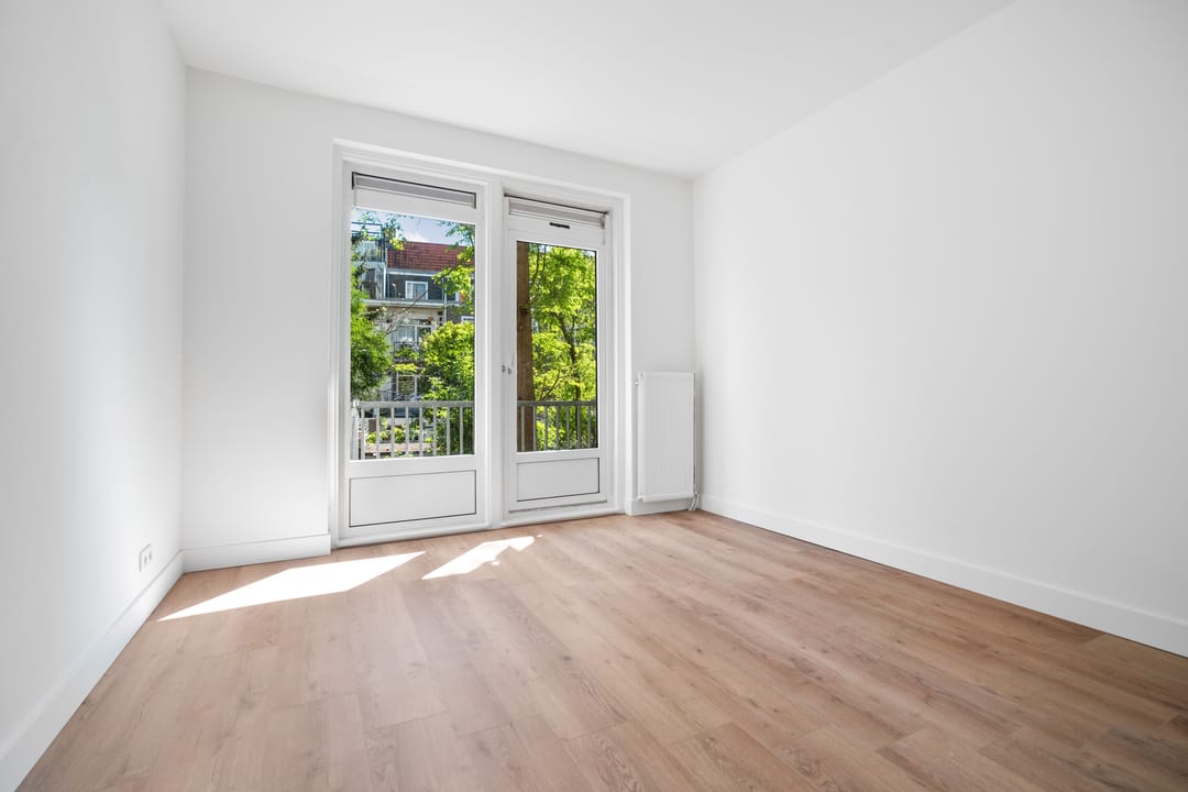 Light Renovated Apartment with South-Facing Balcony and 3-Room Potential — 22