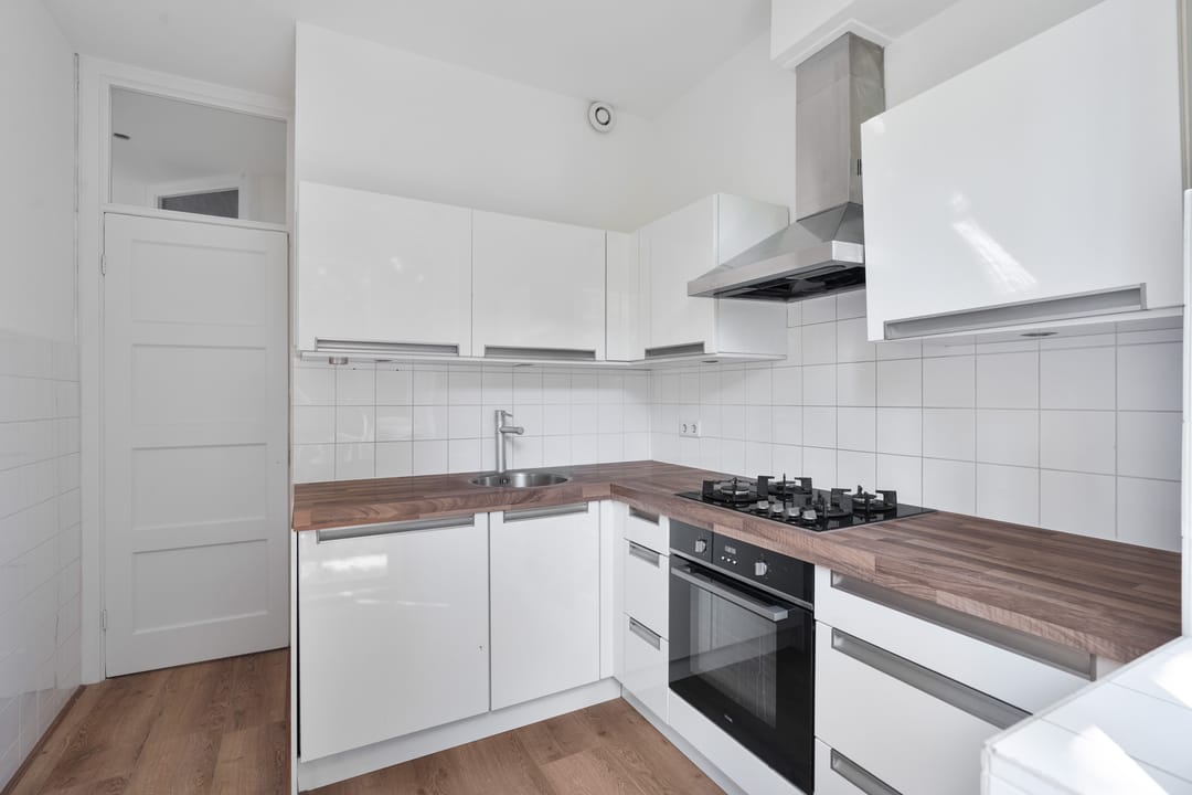 Light Renovated Apartment with South-Facing Balcony and 3-Room Potential — 13