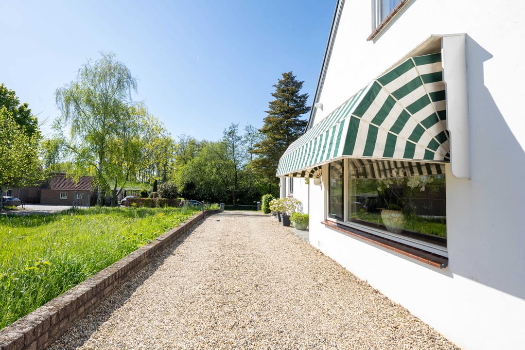 Charming detached home with near park-like garden near the Waal river in Dreumel — 53