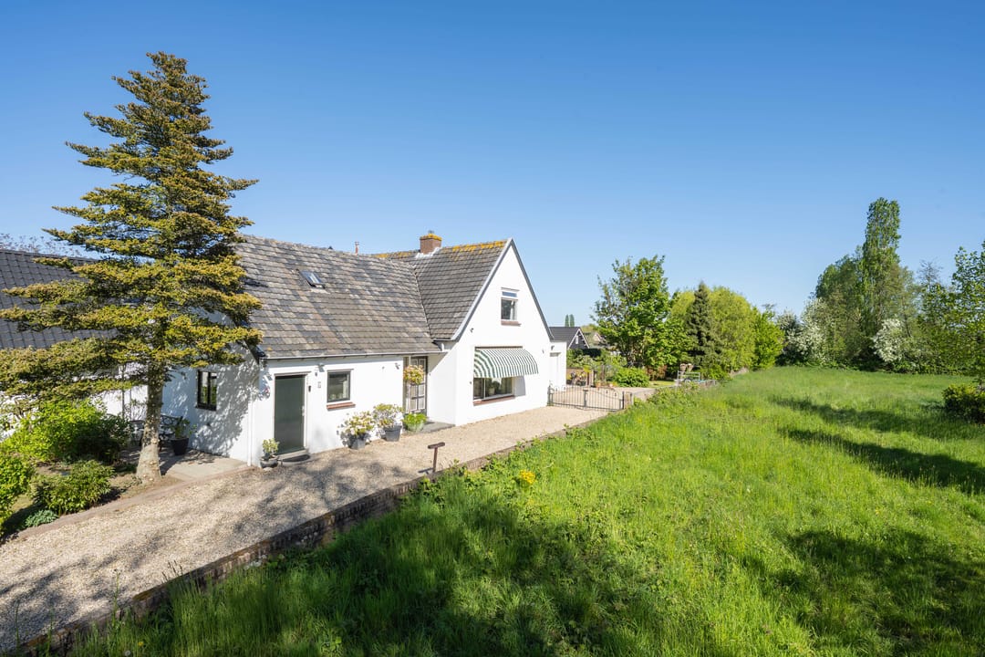 Charming detached home with near park-like garden near the Waal river in Dreumel — 82