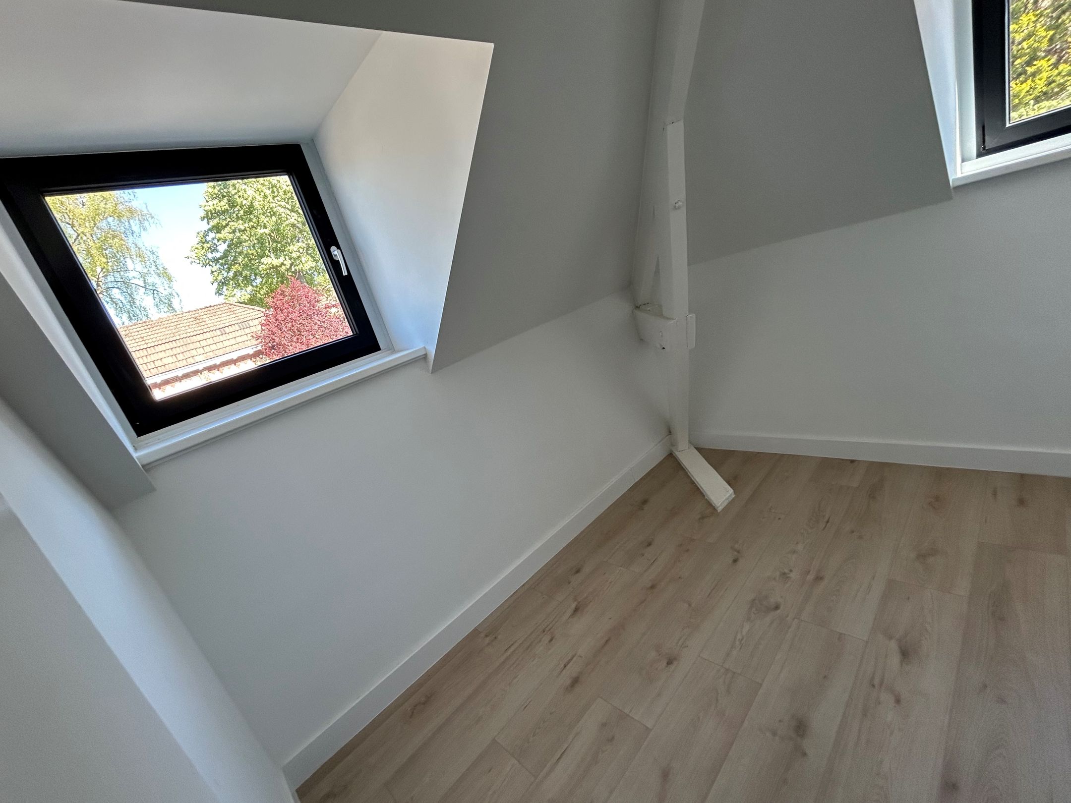Fully Renovated Energy-Neutral Corner Home with Solar Panels and Floor Heating — 21