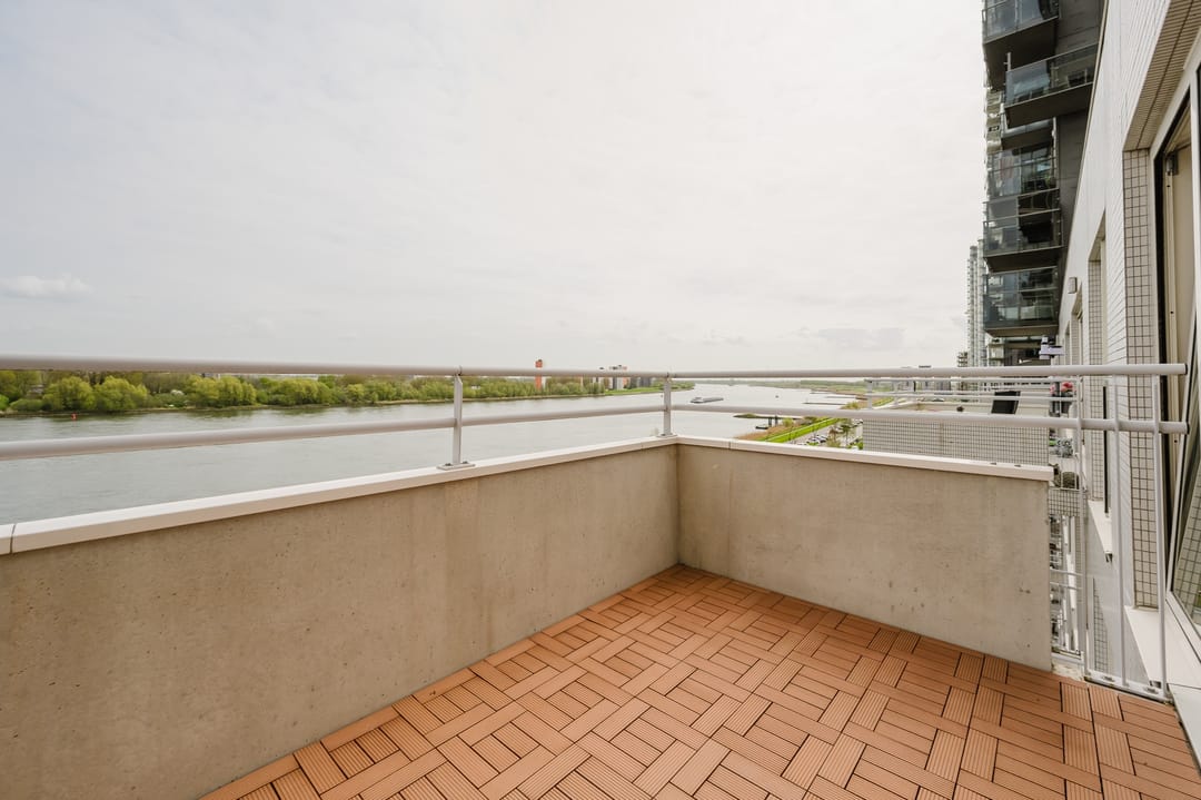 Modern fifth-floor apartment with stunning Maas river views — 13