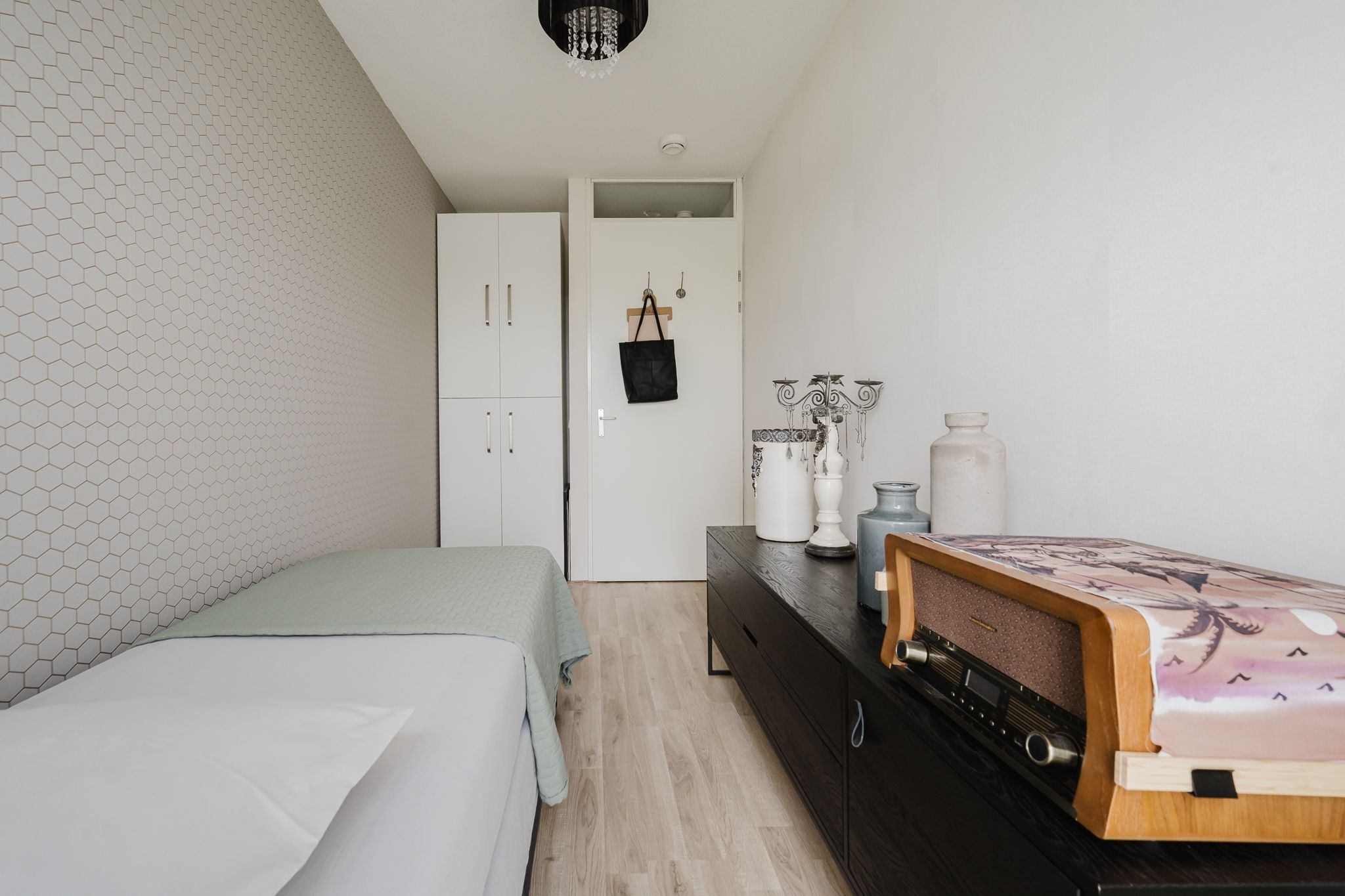 Modern fifth-floor apartment with stunning Maas river views — 24