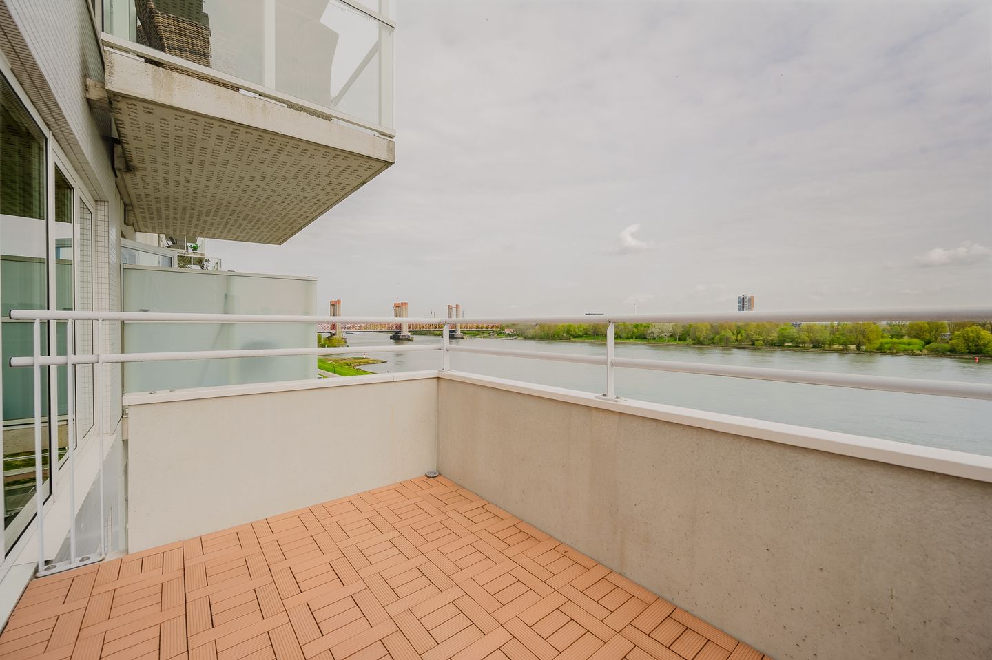 Modern fifth-floor apartment with stunning Maas river views — 14