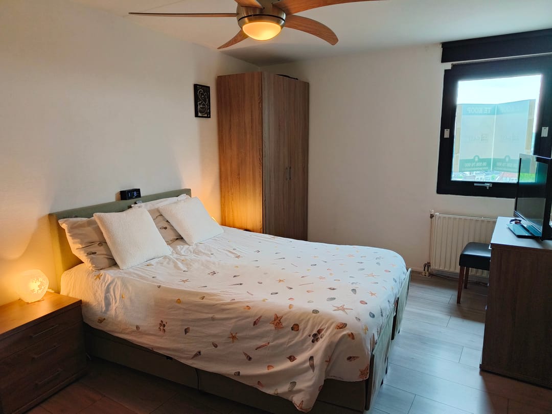 Spacious corner apartment with sunny balcony and two parking spots — 13