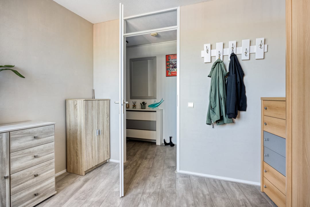 Ruime 3-kamer woning met zonnig zuidenbalkon in rustige Rotterdam-Zuid wijk — 31