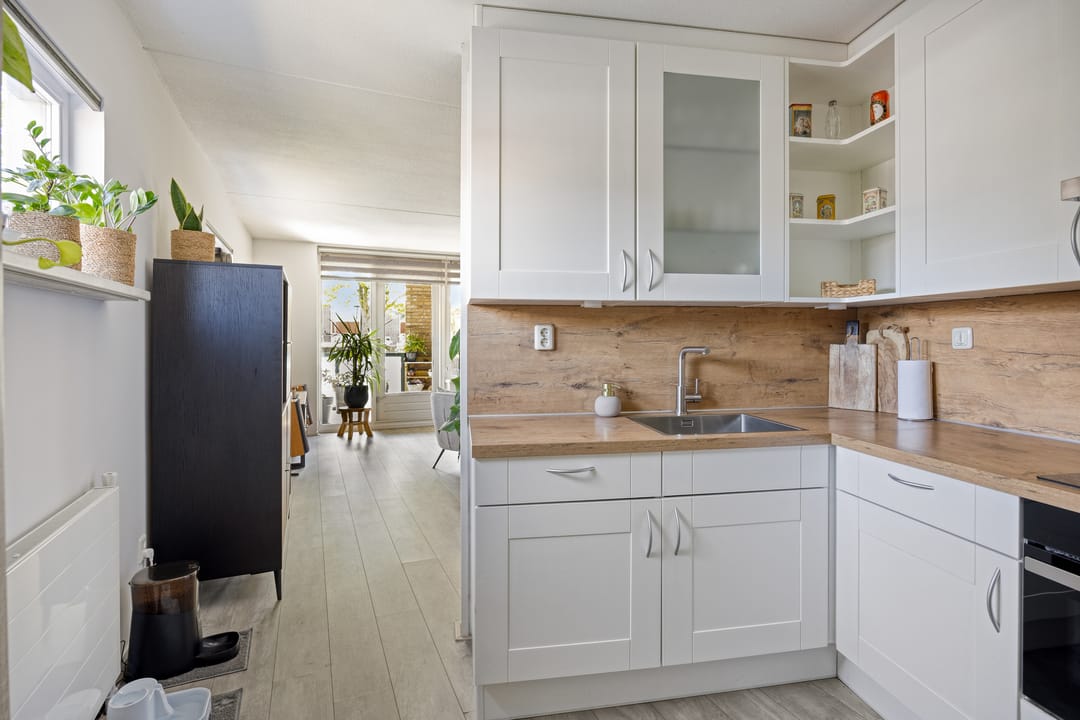 Ruime 3-kamer woning met zonnig zuidenbalkon in rustige Rotterdam-Zuid wijk — 26
