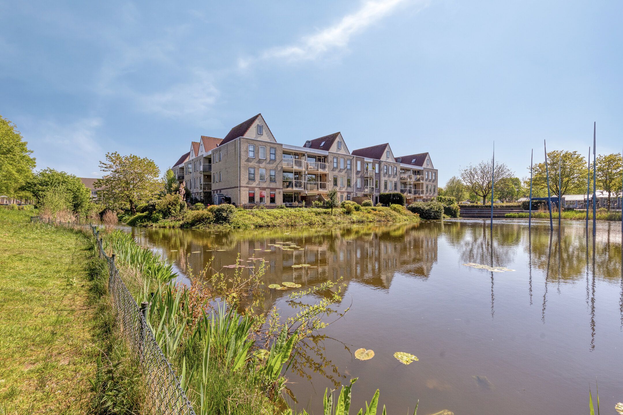 Light and Playful Apartment with Extra Floor Level and Water View — 33